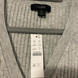 Jcrew ribbed bell sleeve v neck midi dress. Size med but can fit large